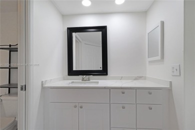 Step into this spacious first-floor unit in the highly on Flamingo Lakes Country Club in Florida - for sale on GolfHomes.com, golf home, golf lot