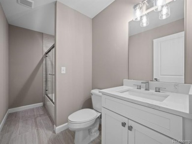 Stunning New Construction End-Unit Condo, adjacent to the on Pine Trace Golf Club in Michigan - for sale on GolfHomes.com, golf home, golf lot