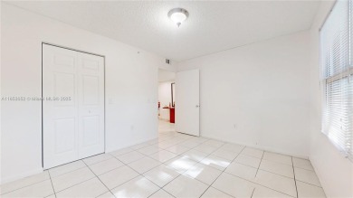 Step into this spacious first-floor unit in the highly on Flamingo Lakes Country Club in Florida - for sale on GolfHomes.com, golf home, golf lot