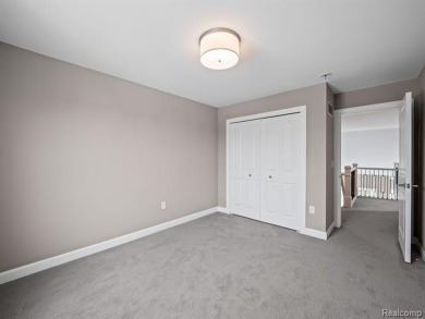 Stunning New Construction End-Unit Condo, adjacent to the on Pine Trace Golf Club in Michigan - for sale on GolfHomes.com, golf home, golf lot