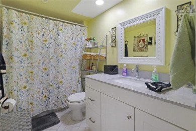 Step into this spacious first-floor unit in the highly on Flamingo Lakes Country Club in Florida - for sale on GolfHomes.com, golf home, golf lot
