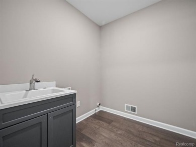 Stunning New Construction End-Unit Condo, adjacent to the on Pine Trace Golf Club in Michigan - for sale on GolfHomes.com, golf home, golf lot