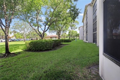 Step into this spacious first-floor unit in the highly on Flamingo Lakes Country Club in Florida - for sale on GolfHomes.com, golf home, golf lot