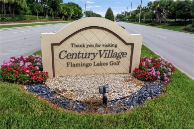 Step into this spacious first-floor unit in the highly on Flamingo Lakes Country Club in Florida - for sale on GolfHomes.com, golf home, golf lot