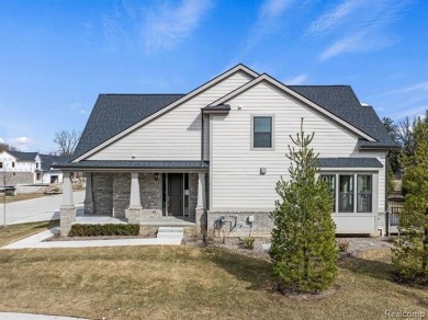 Stunning New Construction End-Unit Condo, adjacent to the on Pine Trace Golf Club in Michigan - for sale on GolfHomes.com, golf home, golf lot