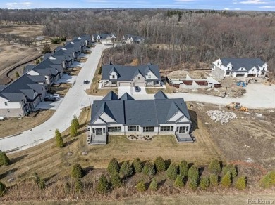 Stunning New Construction End-Unit Condo, adjacent to the on Pine Trace Golf Club in Michigan - for sale on GolfHomes.com, golf home, golf lot