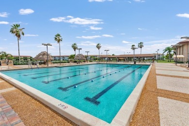 Step into this spacious first-floor unit in the highly on Flamingo Lakes Country Club in Florida - for sale on GolfHomes.com, golf home, golf lot
