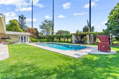 Nestled in a serene cul-de-sac adjacent to Yorba Linda Country on Yorba Linda Country Club in California - for sale on GolfHomes.com, golf home, golf lot