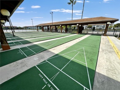 Step into this spacious first-floor unit in the highly on Flamingo Lakes Country Club in Florida - for sale on GolfHomes.com, golf home, golf lot