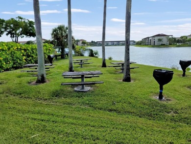 Step into this spacious first-floor unit in the highly on Flamingo Lakes Country Club in Florida - for sale on GolfHomes.com, golf home, golf lot