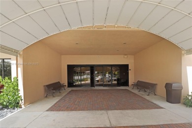 Step into this spacious first-floor unit in the highly on Flamingo Lakes Country Club in Florida - for sale on GolfHomes.com, golf home, golf lot