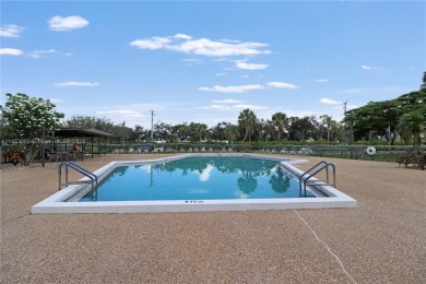 Step into this spacious first-floor unit in the highly on Flamingo Lakes Country Club in Florida - for sale on GolfHomes.com, golf home, golf lot