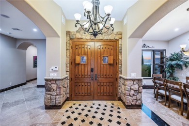 Nearly 6,000 Sq Ft of Purposeful Luxury with Dual Primary Suites on Laughlin Ranch Golf Club in Arizona - for sale on GolfHomes.com, golf home, golf lot