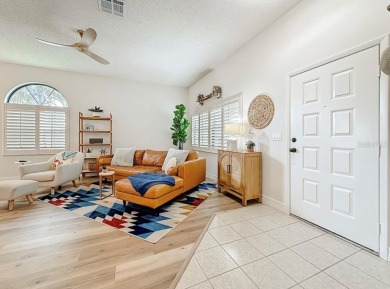 -THIS HOME IS A ABSOLUTE MUST SEE- Experience serene pond views on Lansbrook Golf Club in Florida - for sale on GolfHomes.com, golf home, golf lot