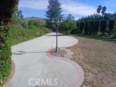 Welcome to this exceptional opportunity to own a spacious on Canyon Crest Country Club in California - for sale on GolfHomes.com, golf home, golf lot