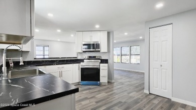 BUYERS HOME SALE FELL THROUGH!!!!!! Beautifully remodeled 2 on Barefoot Bay Golf Course in Florida - for sale on GolfHomes.com, golf home, golf lot