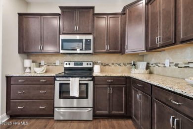 Welcome to this impeccably maintained 4-bedroom home nestled in on Beau Rivage Golf and Resort in North Carolina - for sale on GolfHomes.com, golf home, golf lot
