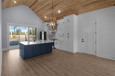 MOVE-IN READY NEW CONSTRUCTION, JUST IN TIME FOR THE SUMMER! NO on Sapelo Hammock Golf Club in Georgia - for sale on GolfHomes.com, golf home, golf lot