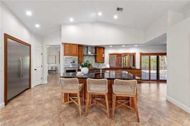 Set on an oversized golf-course lot with eastern rear exposure on Wildcat Run Golf and Country Club in Florida - for sale on GolfHomes.com, golf home, golf lot