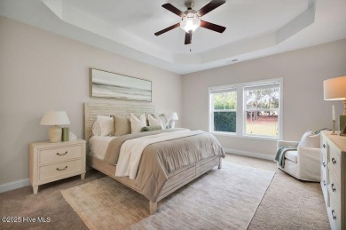Welcome to this impeccably maintained 4-bedroom home nestled in on Beau Rivage Golf and Resort in North Carolina - for sale on GolfHomes.com, golf home, golf lot