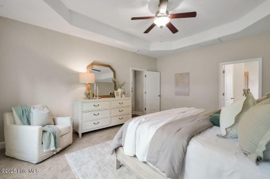 Welcome to this impeccably maintained 4-bedroom home nestled in on Beau Rivage Golf and Resort in North Carolina - for sale on GolfHomes.com, golf home, golf lot