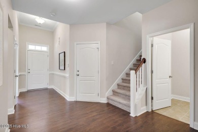 Welcome to this impeccably maintained 4-bedroom home nestled in on Beau Rivage Golf and Resort in North Carolina - for sale on GolfHomes.com, golf home, golf lot