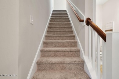 Welcome to this impeccably maintained 4-bedroom home nestled in on Beau Rivage Golf and Resort in North Carolina - for sale on GolfHomes.com, golf home, golf lot