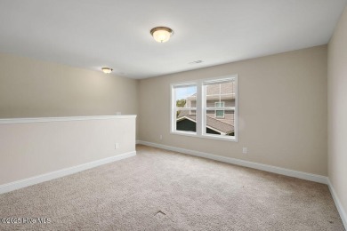 Welcome to this impeccably maintained 4-bedroom home nestled in on Beau Rivage Golf and Resort in North Carolina - for sale on GolfHomes.com, golf home, golf lot