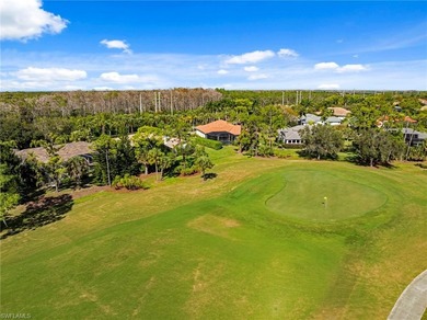 Set on an oversized golf-course lot with eastern rear exposure on Wildcat Run Golf and Country Club in Florida - for sale on GolfHomes.com, golf home, golf lot