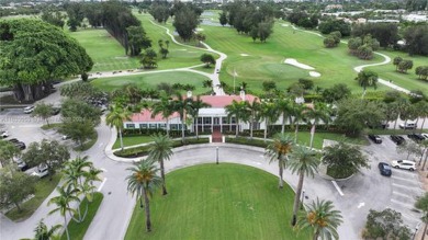 Live in the coveted gated Normandy Shores boasting a premier on Normandy Shores Golf Course in Florida - for sale on GolfHomes.com, golf home, golf lot