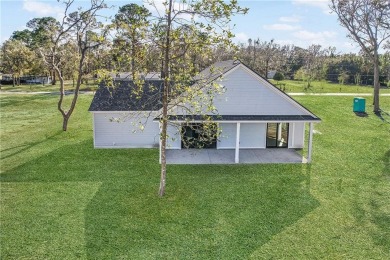 MOVE-IN READY NEW CONSTRUCTION, JUST IN TIME FOR THE SUMMER! NO on Sapelo Hammock Golf Club in Georgia - for sale on GolfHomes.com, golf home, golf lot