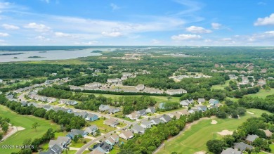 Welcome to this impeccably maintained 4-bedroom home nestled in on Beau Rivage Golf and Resort in North Carolina - for sale on GolfHomes.com, golf home, golf lot