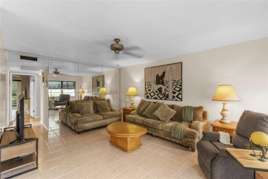 LOCATION LOCATION!!! HIGHLY DESIRABLE CORNER UNIT ON THE TOP on Hillsboro Pines Golf in Florida - for sale on GolfHomes.com, golf home, golf lot