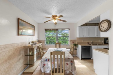 LOCATION LOCATION!!! HIGHLY DESIRABLE CORNER UNIT ON THE TOP on Hillsboro Pines Golf in Florida - for sale on GolfHomes.com, golf home, golf lot