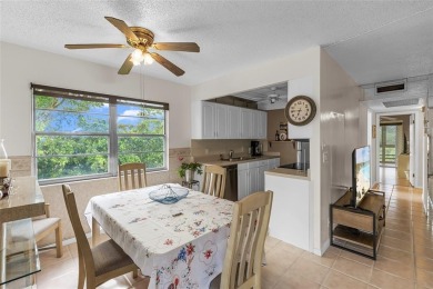 LOCATION LOCATION!!! HIGHLY DESIRABLE CORNER UNIT ON THE TOP on Hillsboro Pines Golf in Florida - for sale on GolfHomes.com, golf home, golf lot
