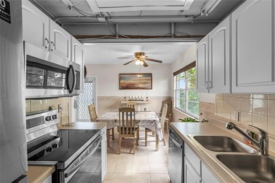 LOCATION LOCATION!!! HIGHLY DESIRABLE CORNER UNIT ON THE TOP on Hillsboro Pines Golf in Florida - for sale on GolfHomes.com, golf home, golf lot
