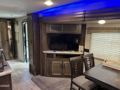 Nice RV lot with plenty of trees, nice patio, and firepit area on Bent Creek Golf Course in Tennessee - for sale on GolfHomes.com, golf home, golf lot