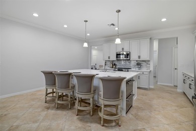 When a floor plan is thoughtfully redesigned to meet modern on River Strand Golf and Country Club At Heritage Harbour  in Florida - for sale on GolfHomes.com, golf home, golf lot