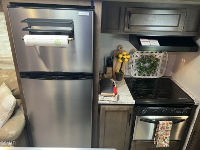 Nice RV lot with plenty of trees, nice patio, and firepit area on Bent Creek Golf Course in Tennessee - for sale on GolfHomes.com, golf home, golf lot