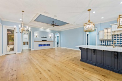 Tucked away on a spacious private lot in the guard gated on Lake Jovita Golf and Country Club in Florida - for sale on GolfHomes.com, golf home, golf lot