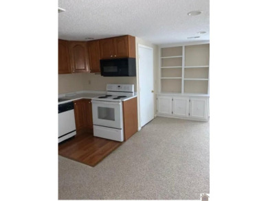 Nice, spacious 2 bedrooms, 1 bath condo which has a beautiful on Mayfield-Graves Country Club in Kentucky - for sale on GolfHomes.com, golf home, golf lot