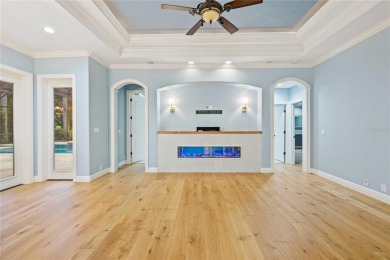 Tucked away on a spacious private lot in the guard gated on Lake Jovita Golf and Country Club in Florida - for sale on GolfHomes.com, golf home, golf lot