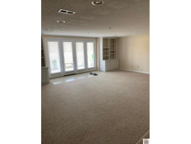 Nice, spacious 2 bedrooms, 1 bath condo which has a beautiful on Mayfield-Graves Country Club in Kentucky - for sale on GolfHomes.com, golf home, golf lot