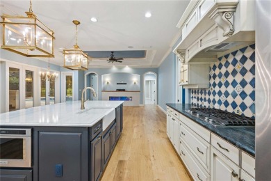 Tucked away on a spacious private lot in the guard gated on Lake Jovita Golf and Country Club in Florida - for sale on GolfHomes.com, golf home, golf lot