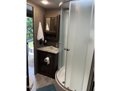 Nice RV lot with plenty of trees, nice patio, and firepit area on Bent Creek Golf Course in Tennessee - for sale on GolfHomes.com, golf home, golf lot