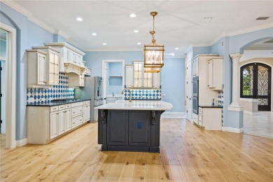 Tucked away on a spacious private lot in the guard gated on Lake Jovita Golf and Country Club in Florida - for sale on GolfHomes.com, golf home, golf lot