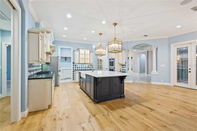 Tucked away on a spacious private lot in the guard gated on Lake Jovita Golf and Country Club in Florida - for sale on GolfHomes.com, golf home, golf lot