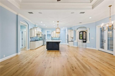 Tucked away on a spacious private lot in the guard gated on Lake Jovita Golf and Country Club in Florida - for sale on GolfHomes.com, golf home, golf lot