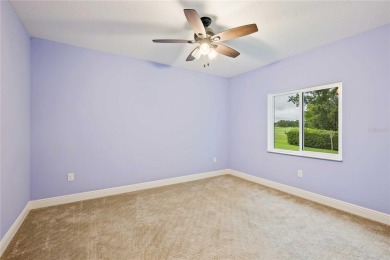 Tucked away on a spacious private lot in the guard gated on Lake Jovita Golf and Country Club in Florida - for sale on GolfHomes.com, golf home, golf lot