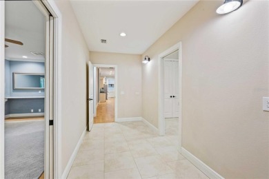Tucked away on a spacious private lot in the guard gated on Lake Jovita Golf and Country Club in Florida - for sale on GolfHomes.com, golf home, golf lot